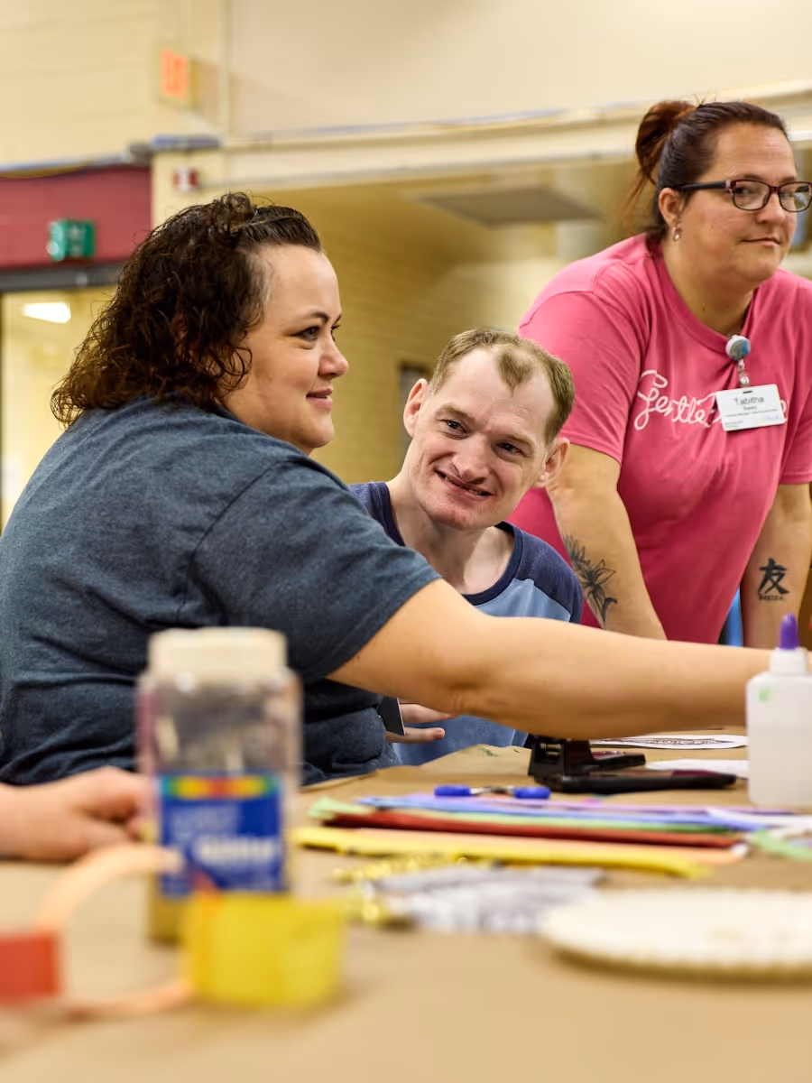 Individual with developmental disabilities engaging with a GentleBrook staff member at the Holmesville location, highlighting personalized support and compassionate care at 8001 Township Rd 574 in Holmesville, Ohio